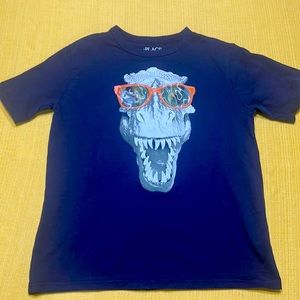 Blue graphic tee w/ logo “pic of a dinosaur “